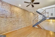 Large living room with floating stairs