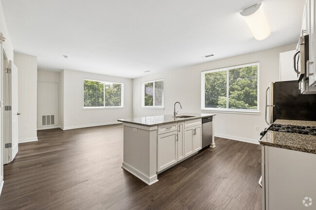 2BR, 2BA - 1,320SF - Kitchen and Living Room