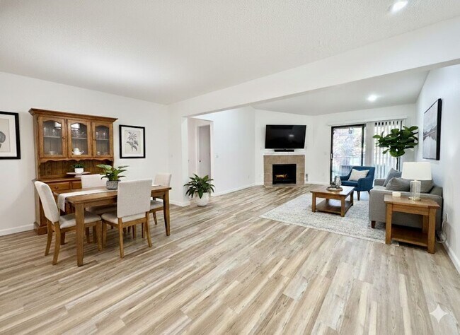 Building Photo - **$500 Off 2nd Month's Rent** Stunning 2 Bedroom Condo with Fireplace, Modern Upgrades and Air Co...