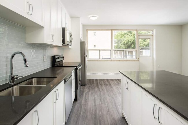 Photo - 2893-2897 St Clair Av E