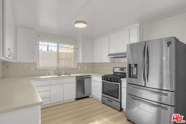 Photo - 7701 Baird Ave