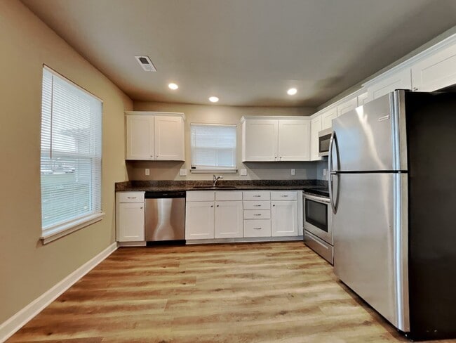 Photo - Spacious 3-Bedroom Home with Hardwood Floors & Patio in Blue Springs, MO