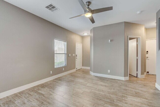 Photo - "Chic 2-Bed Oasis with Modern Vinyl Plank Flooring in Henderson's Heart!"