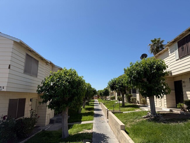 Photo - 3 Bedroom Townhouse with a 2 car garage and a middle courtyard area
