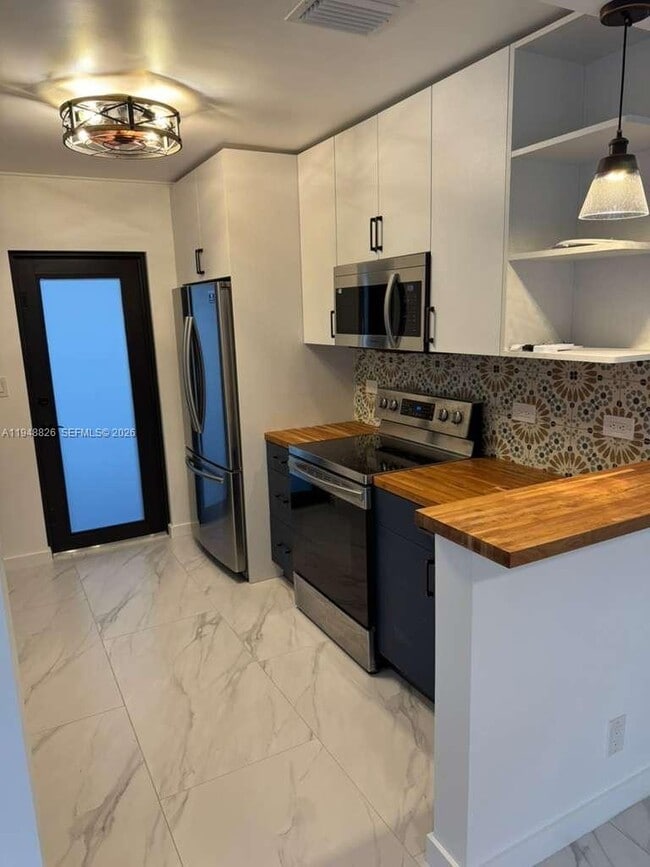 Photo - 117 NE 2nd Terrace Unit FRONT