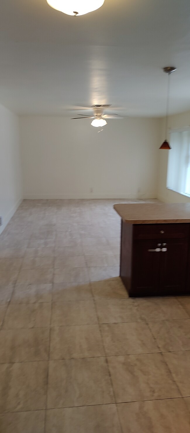 kitchen and living room open floor plan - 12126 Gibbs Rd Unit 12126