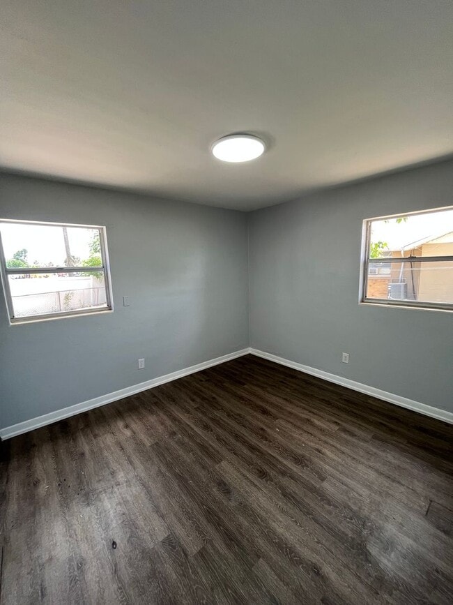 Photo - Great Location for This 4BR/1BA Lakeland Home! Large Screened In Porch, Fenced Backyard