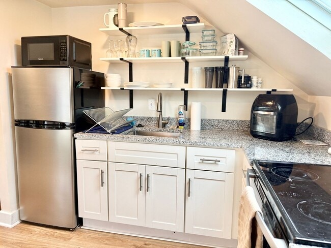 Photo - All Inclusive West End Condo-Fully Furnished with Parking! Unit #3