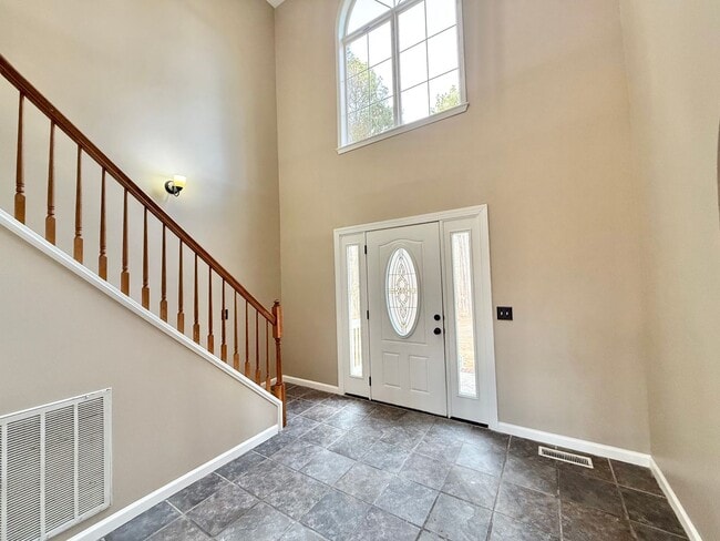 Photo - Private 4BD, 2.5BA Fuquay Varina Home on a Large Lot with a Fenced Yard and First Floor Master Be...