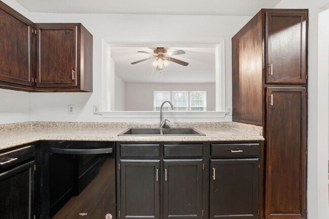 Photo - Welcome home to this charming three-level townhouse in the heart of Springfield!