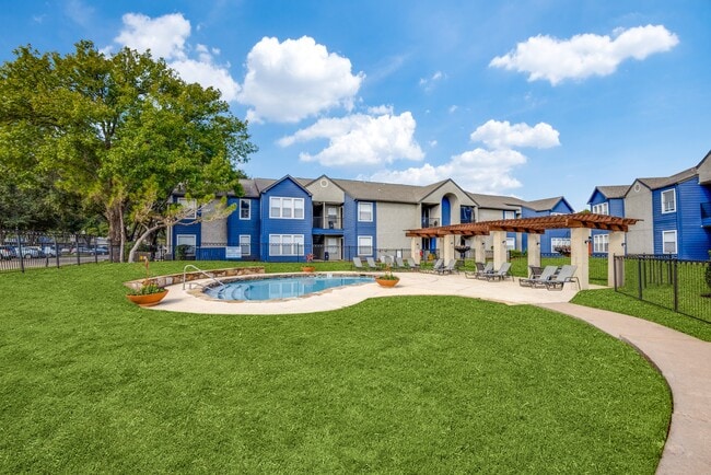 Pool and surrounding green space