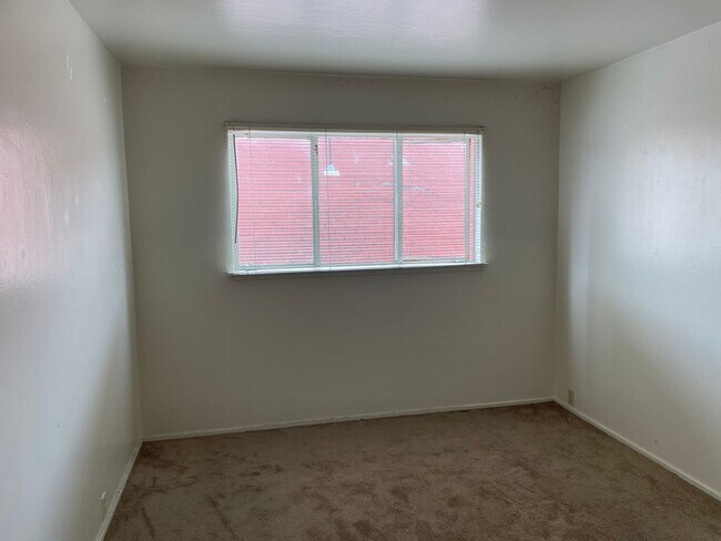 Photo - Updated Kitchen & Bathroom with New Flooring - Top Floor Unit with Fresh Paint Unit 09