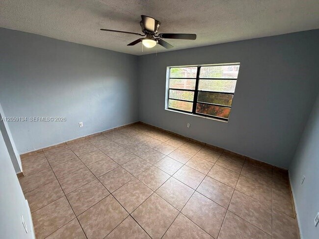 Photo - 1325 W 68th St Unit 111