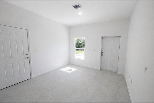 Photo - Move-In Ready Modern New Build: 2BR/2BA with Garage in Lehigh Acres