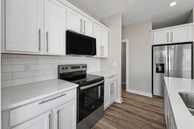 Photo - Luxury New Construction Townhome with Attached 2 Car Garage!