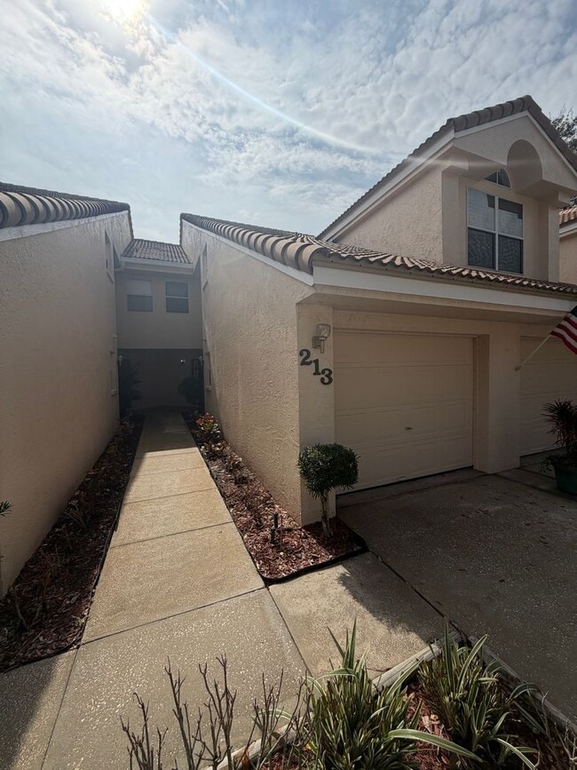 Photo - First floor condo in gated East Lake Woodlands of Oldsmar with one car garage