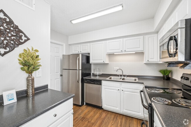 2BR, 1.5BA - 1,030SF - Kitchen - Booker Creek - Students save up to 10%!