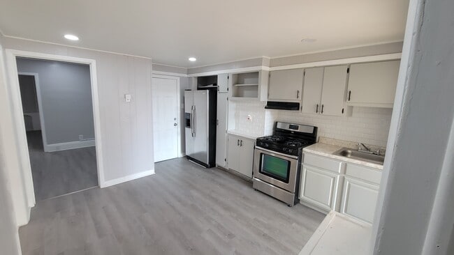 Building Photo - 6116 Palisade Ave Unit 1