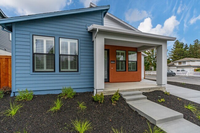 Photo - Bright and Beautiful 3 bedroom 2 full bathroom Home! Attached two car tandem garage with large en...