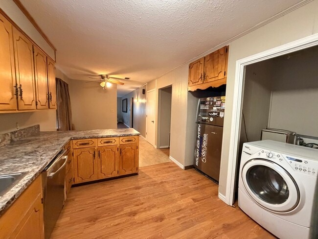 Photo - Welcome to this charming 3-bedroom, 2-bathroom home located in the heart of Russellville