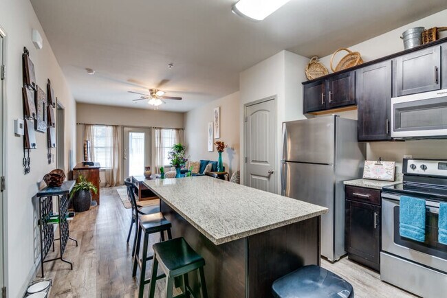 Building Photo - Remi Apartment Homes