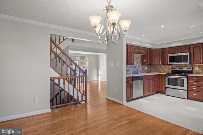 Photo - Conveniently Located Townhouse with Versatile Living Spaces