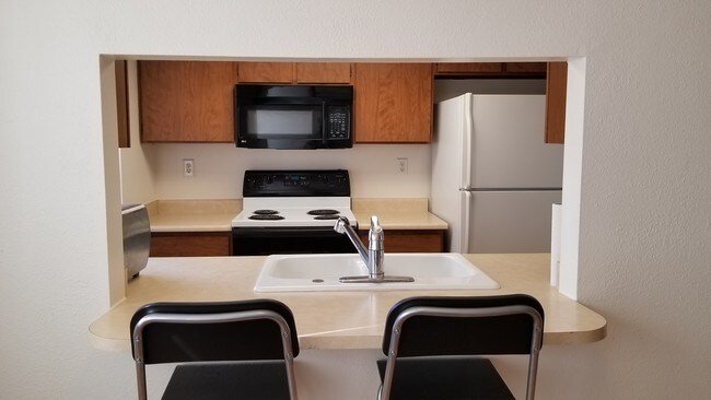 1111 E University Dr  