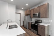 3BR, 2BA - 1,200SF