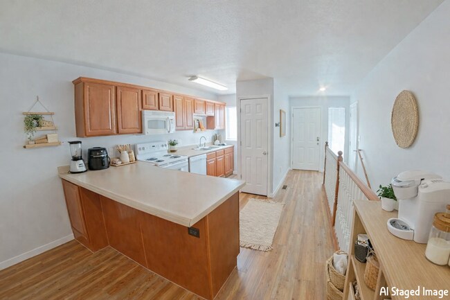 Photo - Backyard Deck + Attached Garage + Pet Friendly + Washer and Dryer Included! Available January Now!