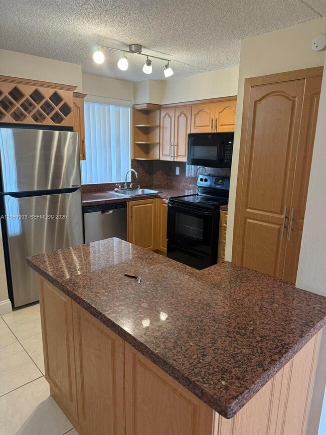 Building Photo - 6045 NW 186th St Unit 309