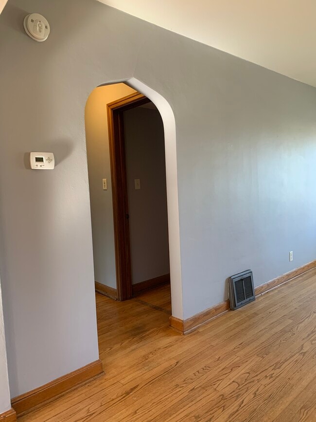 Arched doorway to bedrooms/bathroom - 2329 N 72nd St Unit Lower