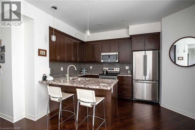 Photo - 2300 Upper Middle Rd W Unité 301