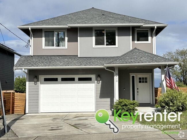 Building Photo - Stylish 4-Bedroom Home with Finished Basem...