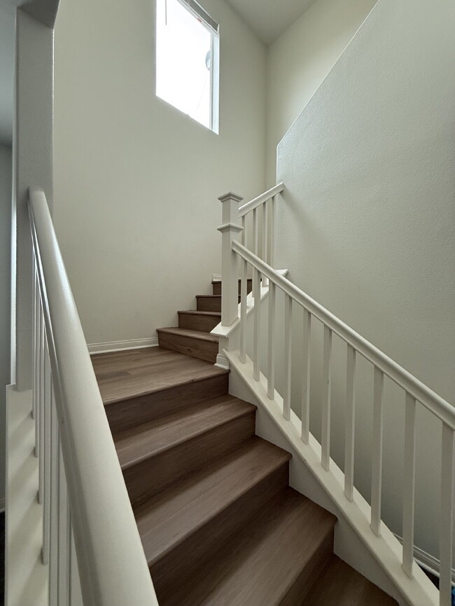 Photo - New flooring & paint!  Large backyard - landscaped and ready for garden!   Community pool, fitnes...