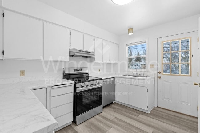 Photo - 11321 E Springfield Ave Unidad 11323 E Springfield Ave