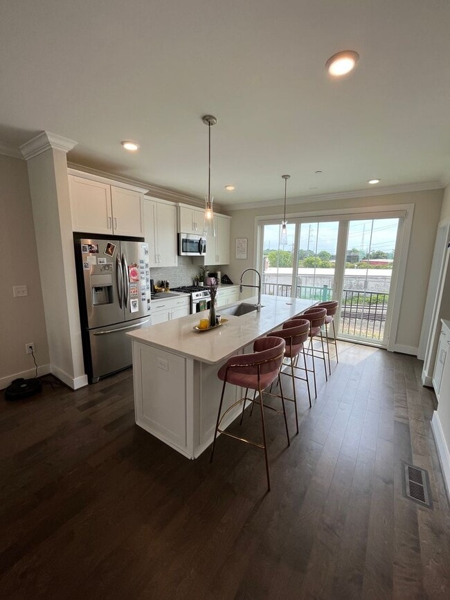 Photo - Stunning 2BD*, 3.5BA Raleigh Townhome with Bonus Office/Den on First Floor and 2-Car Attached Garage