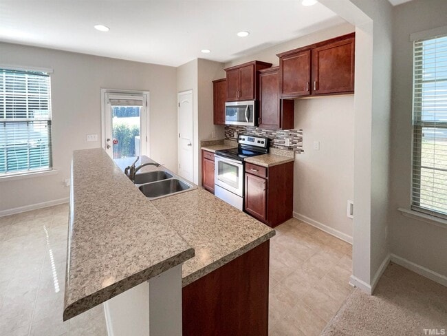 Photo - 3 Bedroom 2.5 Bathroom End Unit Townhome w/ 1 car garage, fenced in backyard in Flowers Plantatio...