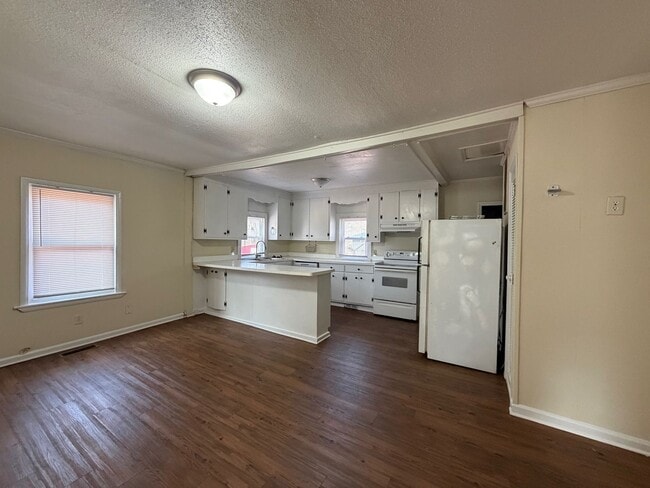 Photo - Great Experiences Are Just Around The Corner. Charming 2 bedroom Ranch Style Bungalow.