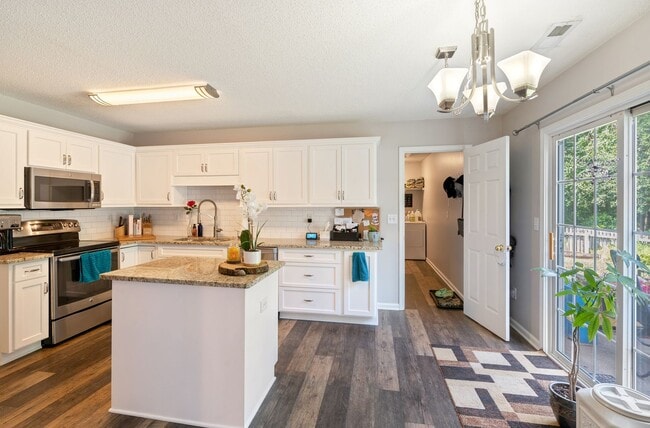 Photo - Corner lot 3 bed 2.5 bath with large fenced yard in Grove Park!