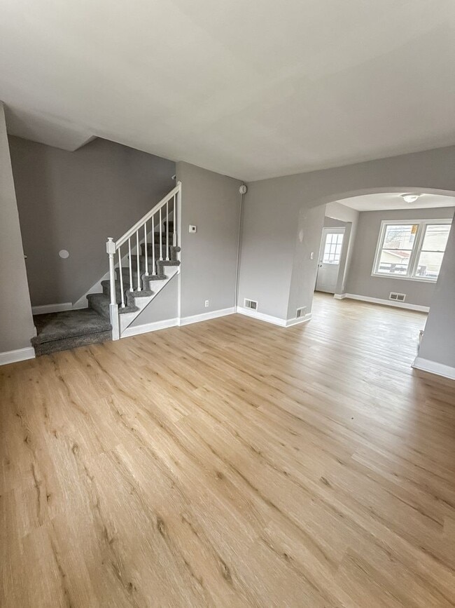 Photo - Home with Modern Kitchen, Finished Basement & Backyard Deck