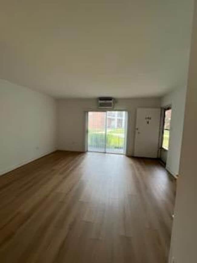 Photo - Elmhurst One Bedroom Apartment ~ Parking Included ~ Cats Welcome Unit 150-04B
