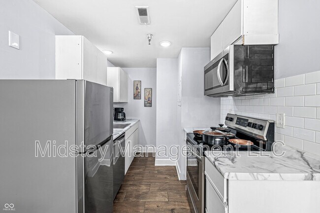 Photo - 230 E 9th St