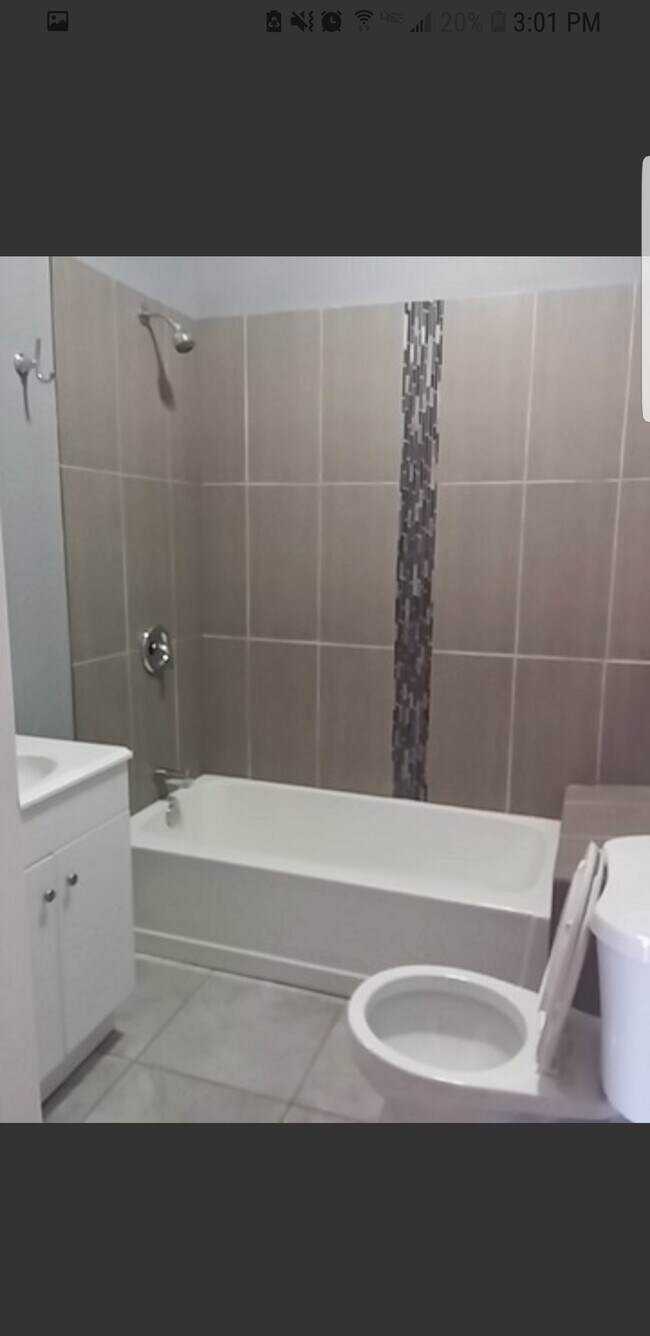 Remodeled unit features clean, modern bathroom. - 2115 S Central Park Ave Unit 2