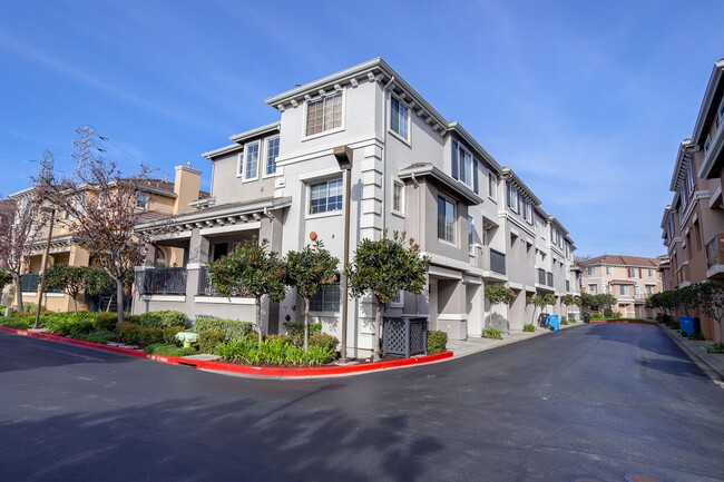 Building Photo - 3 Bed / 2.5 bath, three-level townhome with a bonus home office/den + EV charger in garage. YouTu...