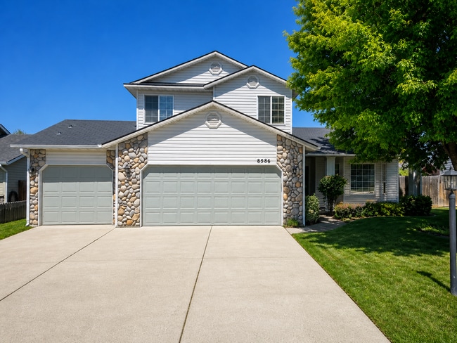 Building Photo - Spacious Home with 3-Car Garage, Two Living Areas & Covered Patio