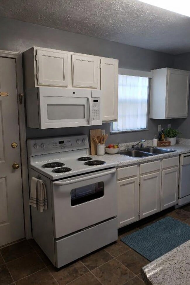 Photo - Auburn Place Town And Garden Homes