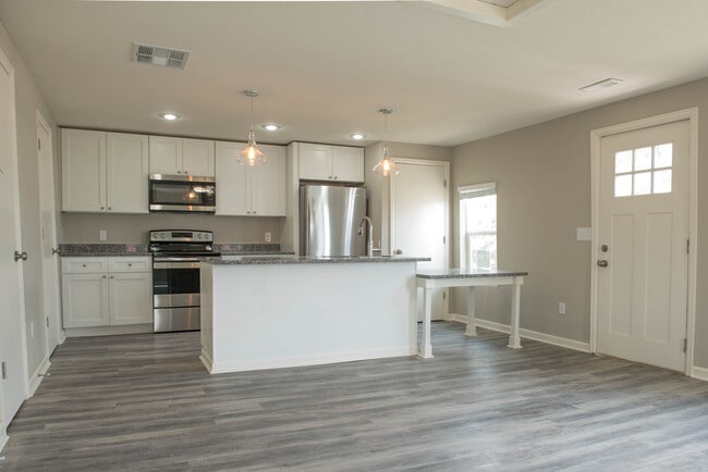 Photo - Remodeled house, yard, Granite, Stainless Steel appliances