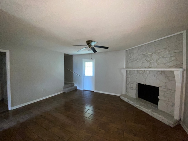 4BR/2BA Millington Rental with Hardwood Flooring, Rustic Fireplace & Large Yard