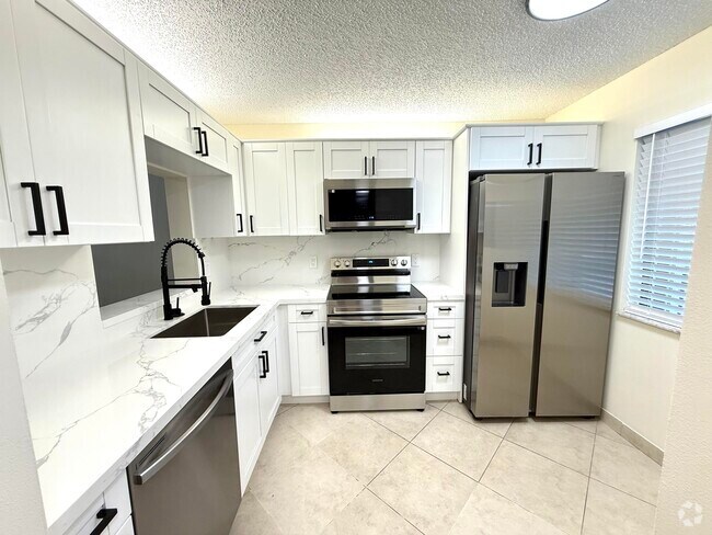 Building Photo - 6649 Somerset Dr Unit 205 Rental