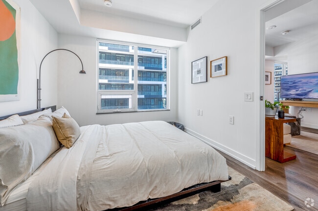 1BR + Den, 2BA - 648SF - Bedroom